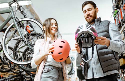 people in a small bike shop